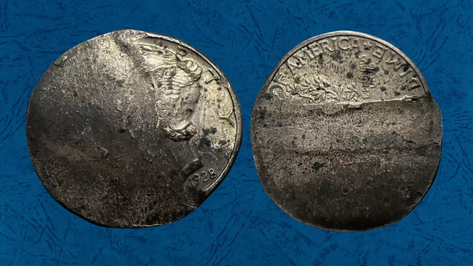 1928 Mercury dime off-center strike error showing shifted design with blank crescent area and visible date